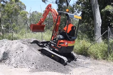 mini excavator going down steep hill|mini ex up a slope.